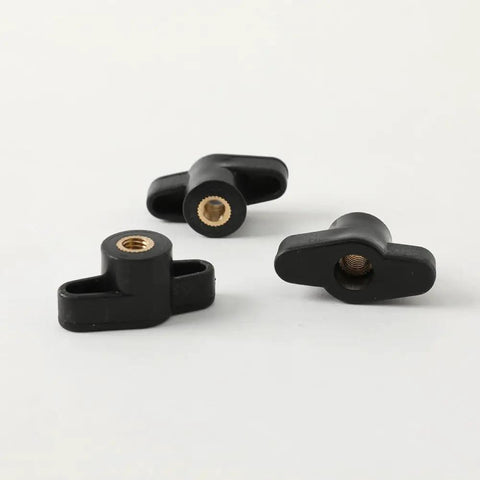 Close-up of three M6 Through Hole Wing Knobs Pack Of 20 With Hella Secure Thumb Screw Threads for easy hand tightening.