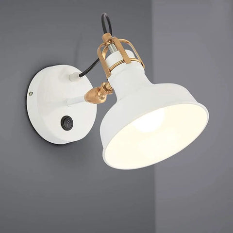 Modern Plug In Wall Sconce Featuring Adjustable C Shade And Easy Peasy Mount Kit with white shade and gold accents on a gray wall.