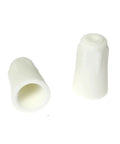 Close-up of two white large ceramic wire connectors for high-temperature splicing