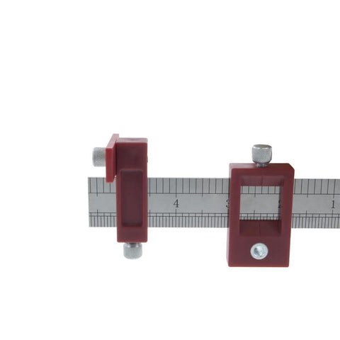 Adjustable Drill Guide Hardware Jig for cabinet handles, knobs, and drawer pulls installations with repeat drilling, side view.