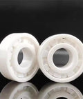 Front view: two white 608 ceramic ball bearings with inner bore, 8x22x7 mm
