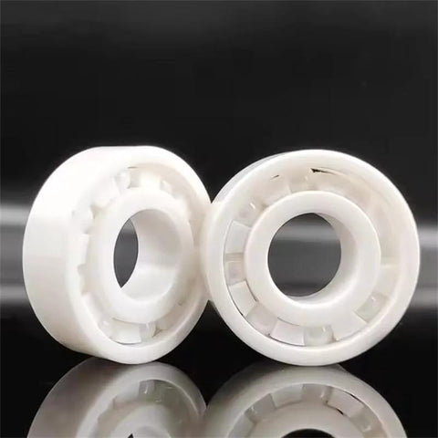 Front view: two white 608 ceramic ball bearings with inner bore, 8x22x7 mm