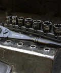 Pass-Thru 25-Piece 3/8 Inch Drive Mechanics Tool Set With X6 Ratchet displayed on metal surface