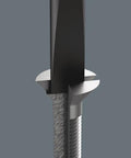 Close-up of ESD Safe Kraftform Micro Slotted Screwdriver tip engaging precise slotted screw, showing black point tip and screw groove interaction.