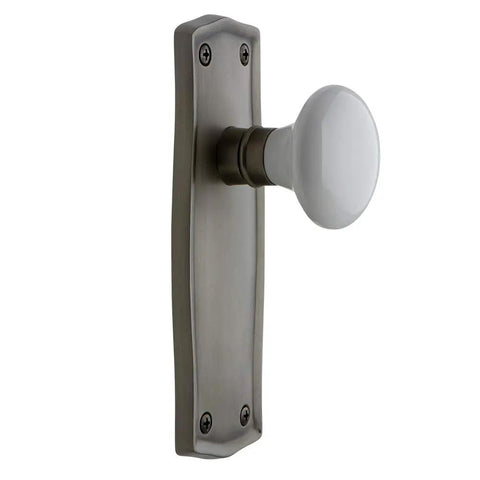 Prairie Plate With White Porcelain Lead Crystal Knob Door Passage Set In Antique Pewter on rectangular solid brass plate.