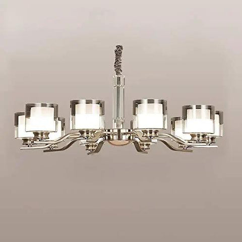 Slick Nickel Four Bulb Led Pendant Chandelier casts pure 5500k white light with modern design and four frosted glass bulbs.