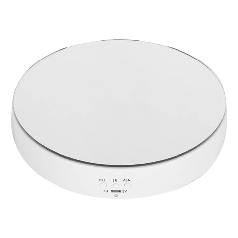 This Awesome Electric Rotating Turntable Display Stand Boasts Heavy Duty 10KG Load Bearing Power For Glittering Jewelry Watches And Digital Gadgets With Smooth Two Way Spin Action And Sleek Mirror Finish Built Tough! - Top view of sleek white rotating display stand.