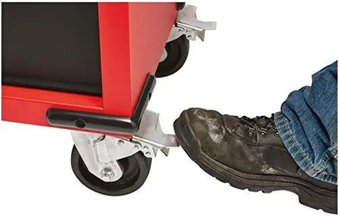 Foot engaging brake on Beefy 52 Inch Mobile Workbench With 11 Soft Close Rollout Drawers And Thick Hardwood Counter Top.
