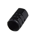Close-up of black aluminum alloy cap from Dodge Valve Stem Caps Set Of 4 With Aluminum Alloy Cap Trim And Resin Emblem 360 Degree Rotating Tire Valve Covers Durable Auto Accessory For Charger Challenger SRT Durango Dart Journey Magnum Nitro Caliber Avenger.