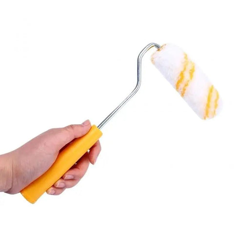 Slick 10 Piece Mini Paint Roller Covers Heavy Duty Acrylic Dripless Wall Wood Fabric Decorating Kit being held, showcasing the roller's absorbent texture.