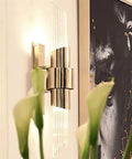 Modern Glass Crystal Wall Sconces, Versatile Bedroom Bedside Lamps And Hallway Light Fixtures Delivering Glare Free Eye Comfort, Effortless Decorative Illumination To Amp Up Your Cozy Space Vibes, wall-mounted crystal fixture next to artwork.