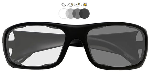 Top Tier Photochromic Safety Glasses With Transition Lenses Shifting Clear To Gray Shades Outdoors Built Different With Wrap Around Design Ansi Z87 Approved And OSHA Compliant For Tough Job Site Grind Impact Resistant close-up view with dark lenses