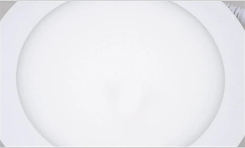 DJVHSRI Recessed Lighting Housing Trim Kits Ultra Slim Recessed Downlight visible angle of flat panel light with smooth white finish.