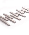 Oudtinx 10-piece precision angle block set; light gray metal blocks arranged diagonally.