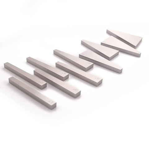 Oudtinx 10-piece precision angle block set; light gray metal blocks arranged diagonally.