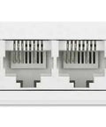 Back view of Eight Port Fast Ethernet Desktop Switch for Home Office and Small Networks, showing 8 auto-sensing Ethernet ports.