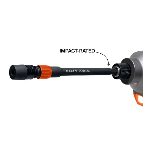 Close-up of Dual Lock 6 Inch Impact Bit Extension With Quick Release And Twist Lock attached to a drill, showing 1/4 Inch Hex Shank.
