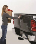 Woman using Tailgate Assist Kit For Ram 1500 2002 To 2008 And Ram 2500 3500 2003 To 2009 Easy Bolt On Install With Ready Thread Locked Nutsert