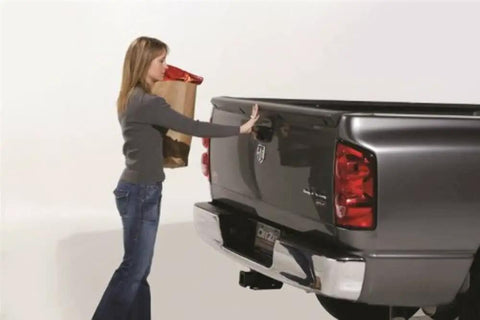 Woman using Tailgate Assist Kit For Ram 1500 2002 To 2008 And Ram 2500 3500 2003 To 2009 Easy Bolt On Install With Ready Thread Locked Nutsert