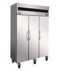 Heavy Duty Triple Door Reach In Freezer With 72 Cubic Feet Of Freezing Space And Stainless Steel Construction on wheels.
