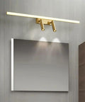 Brass Vanity Light With Adjustable LED Spotlights For Makeup Mirror, 56cm, over mirror cabinet in bathroom setting, soft uniform glow
