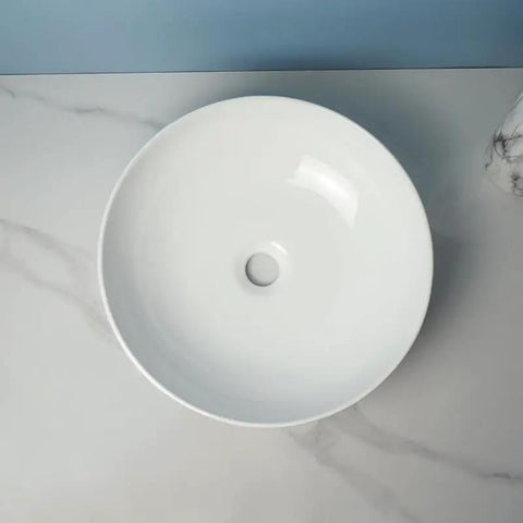 USZWBY Vessel Sinks Modern Simple Round Sink Home Bathroom Above Counter Basin Shopping Mall Toilet Ceramic Wash Bathroom Bowl Sink top view on marble surface.