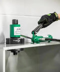 11 Ton Hydraulic Knockout Punch Kit With Hand Pump And Ram in use on metal panel
