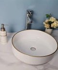 USZWBY Vessel Sinks Simple Hotel Bathroom Ceramic Sink Home Round Above Table Basin with gold rim and modern faucet.