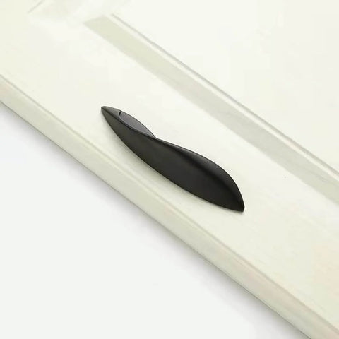 4Pcs Arcuate Cabinet Pulls 3.8 Inch Center To Center S Shaped Matte Black Zinc Alloy installed on cabinet door