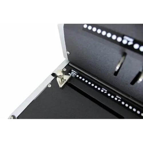 Close-up of CoilMac-ER Plus Manual Coil Punch With Electric Inserter showing disengageable pins and 0.248 inch pitch settings.