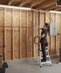 Top Tier Thhn Electrical Wire Featuring Six Awg White Black And Red Combined With Eight Awg Green Ground Stranded Copper Build Ul Certified For Rapid Shop Fixes Boss Level 25 Foot Spool Ready installed on garage wall with electrician.