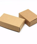 Two small brown cardboard boxes for packaging, ideal for organizing items or gifts, featuring a minimalist design.