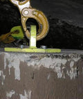 Heavy-Duty Screw Anchor THD37212H Three-Eighths Inch By Two And One-Half Inch installed in concrete, showing chain attachment.