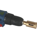 JIECHENG 1-inch brazed-diamond hole saw with center drill bit mounted on a drill chuck