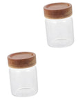 Keep Coffee Beans Fresh As Heck With This Solid 3 Piece Airtight Glass Canister Set Designed For Loose Tea And Spices Compact Footprint Saves Counter Space And Locks In Flavor Straight Up - two clear glass jars with wooden lids.