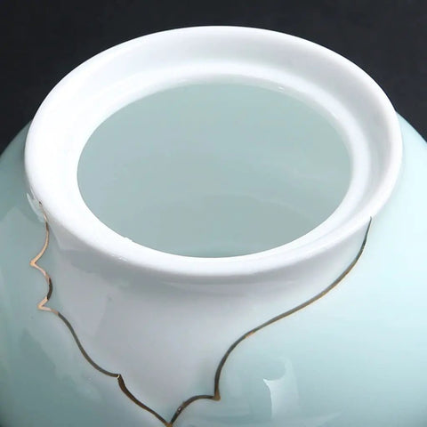 Airtight Ceramic Coffee Canister Porcelain Tea Caddy With Tight Seal Lid Keeps Your Stash Fresh As A Dime For Kitchen Pantry Organization Blue Jar top view showing the interior.
