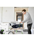 Cordless Table Saw With Battery Powered Circular Blade For Drop Dead Accurate Miter And Parallel Cuts Compact Portable Benchtop Tool in use on job site.