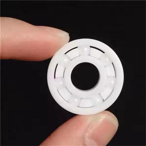 Front view of white 608 ceramic bearing (8x22x7mm) with central bore and outer ring