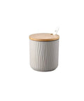 Top Shelf Ceramic Coffee Storage Jar With Secure Wooden Lid And Airtight Design Keeps Daily Grind Sugar Salt Tea Fresh As Ever While Looking Slick On Any Modern Counter Space, gray ceramic with bamboo lid.