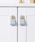 Rock Solid Set Of Six Premium Genuine Cowhide Leather Drawer Pulls With Brass Screws handmade light green cabinet handles on white furniture.