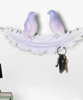 Creative Bird Wall Mounted Coat Rack No Sweat Entryway Setup Rock Solid Hooks For Coats Hats And Keys Easy DIY Mount Multi Room Home Storage Solution with two birds on a feather, key hooks visible, 13.5 inches wide.