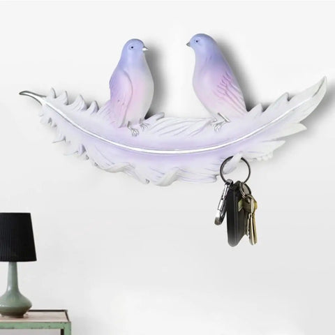 Creative Bird Wall Mounted Coat Rack No Sweat Entryway Setup Rock Solid Hooks For Coats Hats And Keys Easy DIY Mount Multi Room Home Storage Solution with two birds on a feather, key hooks visible, 13.5 inches wide.