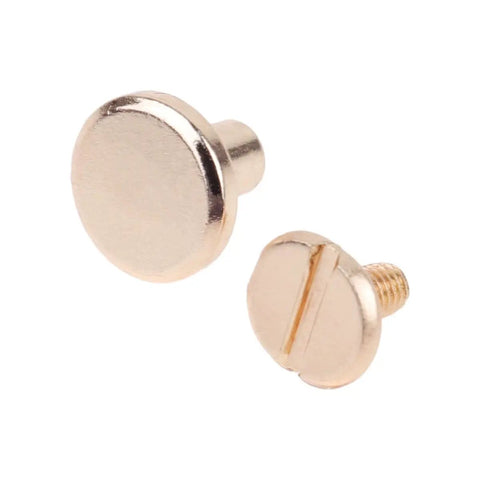 Top Shelf Copper Flat Head Rivet Screws, Thirty Pack Chicago Fasteners For Leather Crafting, Notebook Binding, And Belt Repairs, Solid Metal Hardware Kits For Serious Diy Builders, close-up of copper rivets.