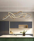 Statement Piece Stainless Steel LED Pendant Chandelier With Gold Ring Accents Adjustable Hanging Lamp For Dining Rooms above modern kitchen island.
