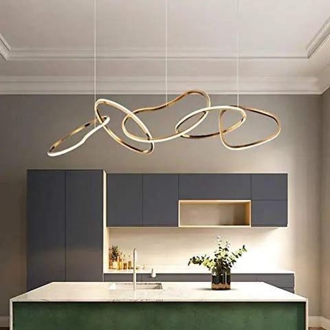 Statement Piece Stainless Steel LED Pendant Chandelier With Gold Ring Accents Adjustable Hanging Lamp For Dining Rooms above modern kitchen island.