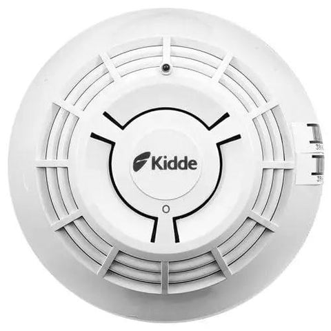 Rotary Addressable Optical Smoke Detector Featuring Photoelectric Sensing And Quick Nuisance Rejection For Dead Simple Fire Alarm Setup And Straight Up Reliable Performance In Any Commercial Space, top view.