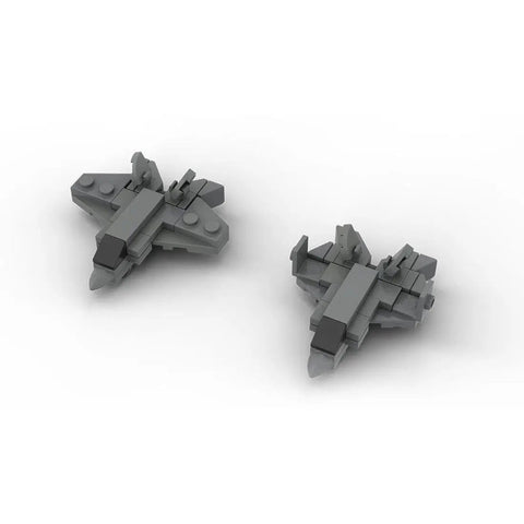 Two gray building block fighter jets from the Ultimate Boss 652 Piece Naval Aircraft Carrier Building Blocks Set 1 To 300 Scale.