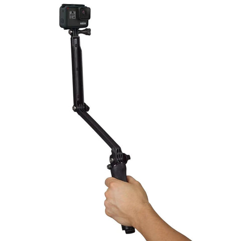 Hand holding 3 In 1 Do It All Action Camera Grip Arm And Tripod For All In One Stability, Detachable Handle For Handheld Shots.