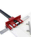 Red Ultimate Cabinet Jig Bundle For DIYers with Cabinet Hardware Jig and handle installation tools on white cabinet panel.