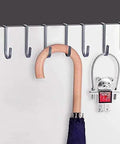Rock Solid Stainless Steel Wall Mounted Coat Rack Featuring Smooth Polished S Shaped Hooks with umbrella and decorative keychain.